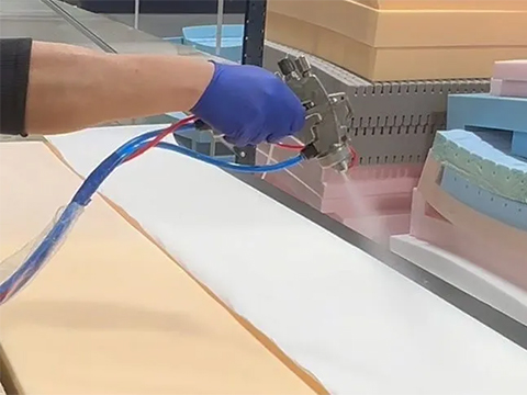 Fire retardant two-part water-based adhesive